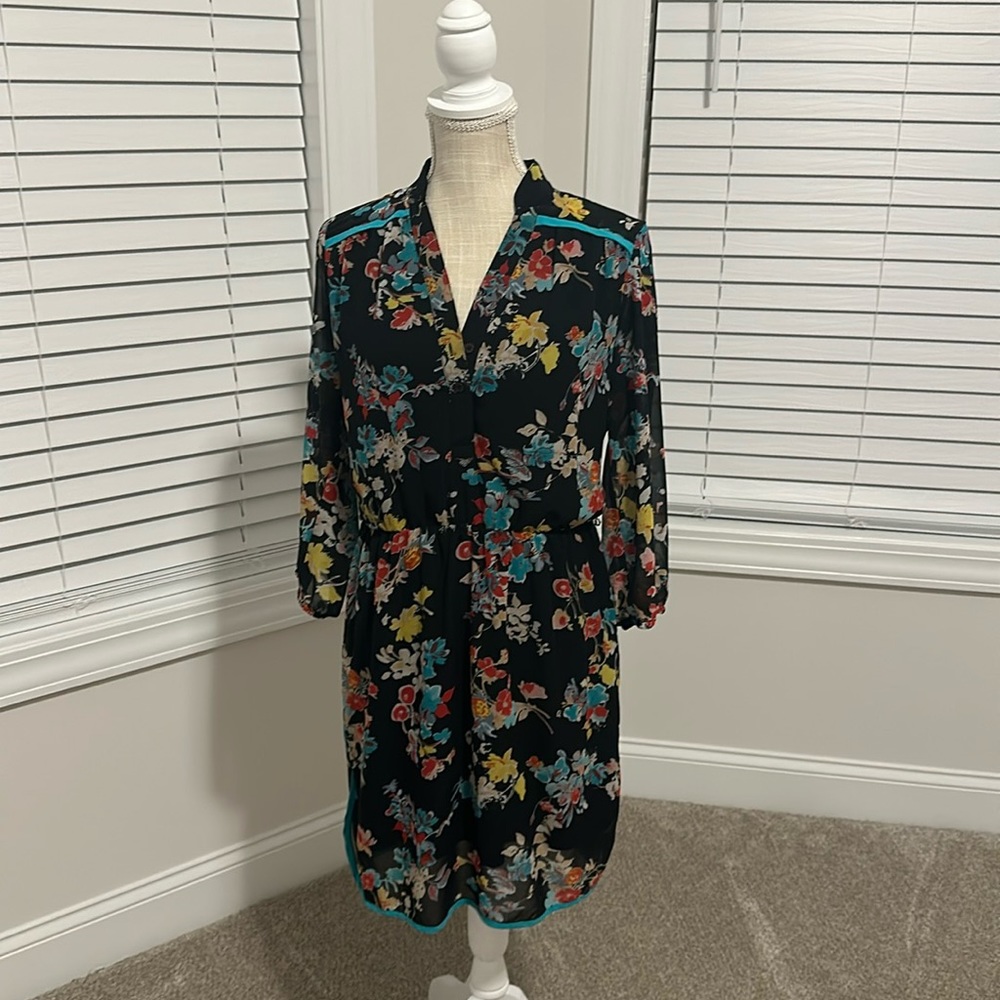 Gently used woman’s button up dress